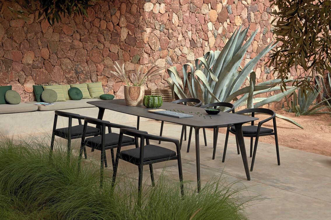 Black dining table with chairs