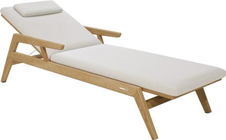 Lounger with armrest